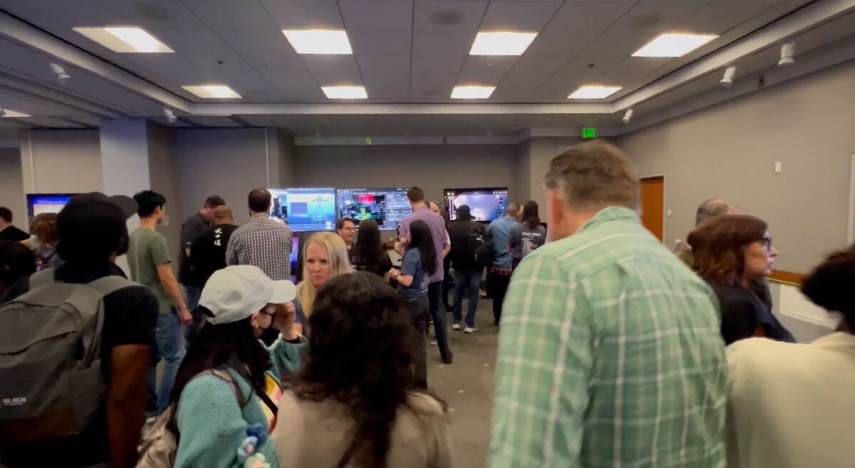 Crowd at Disney's internal technology showcase during a Viz Pro demo