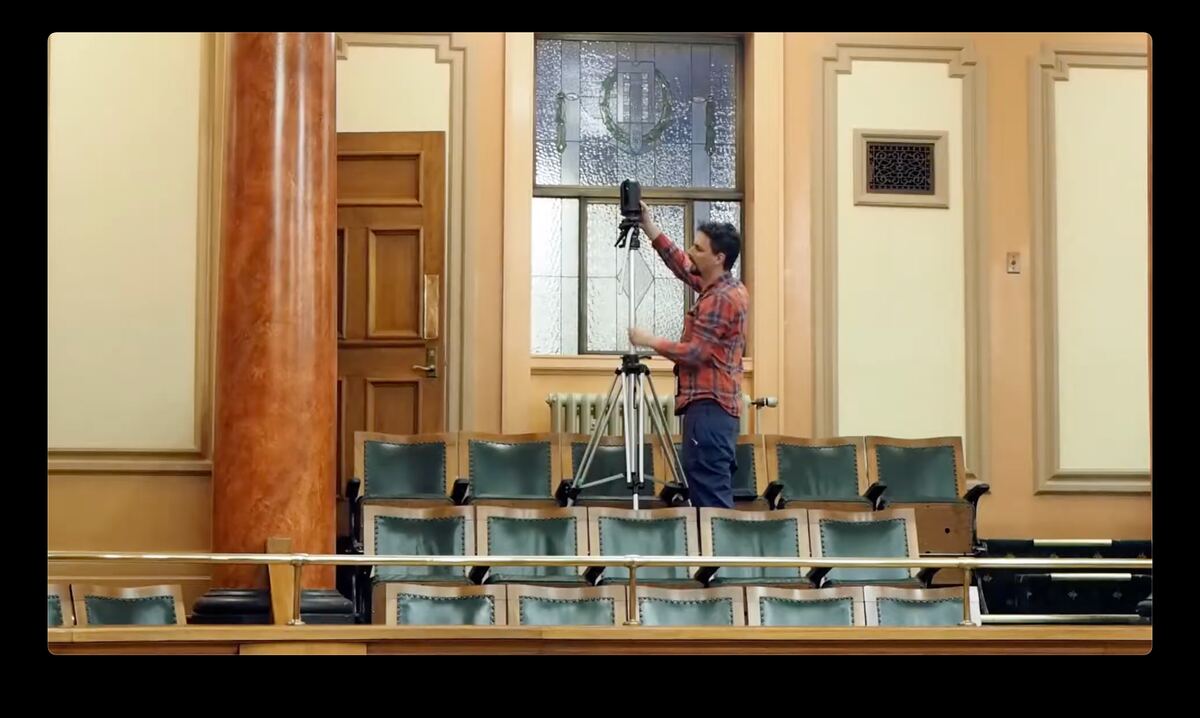 Dan scanning the debating chamber from a tripod rig